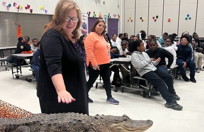 lady touching reptile